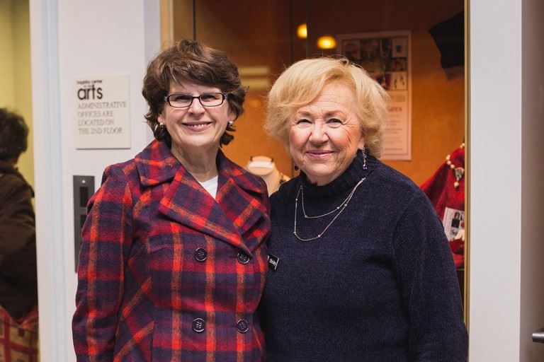 Two women - employee matching gift donation